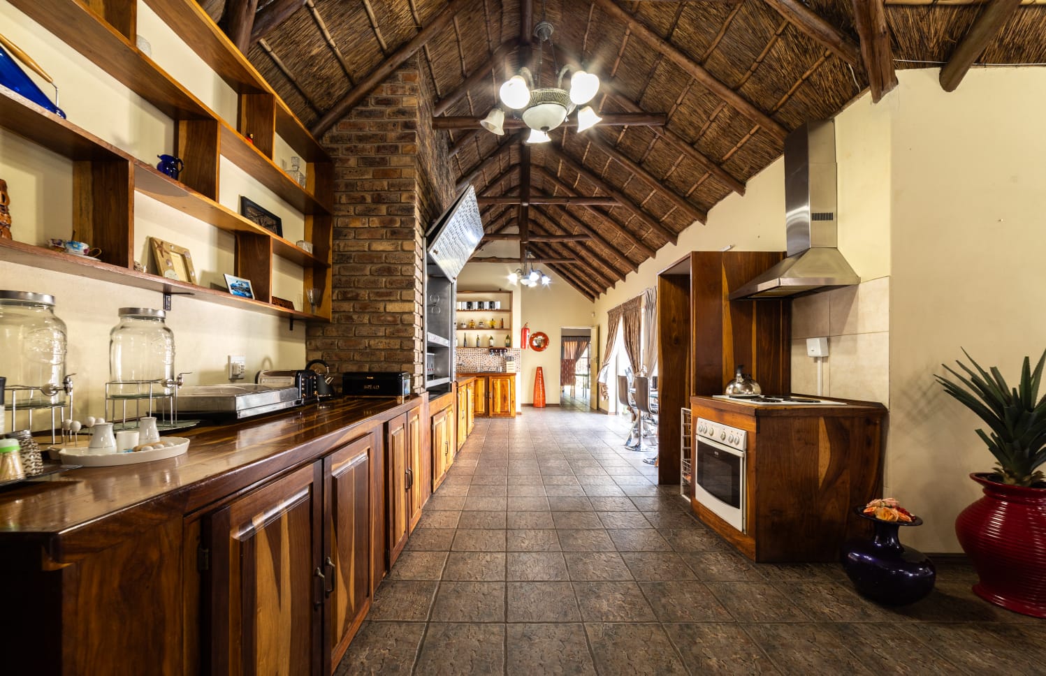 Fully equipped self-catering guest kitchen at Thatch Haven Guesthouse