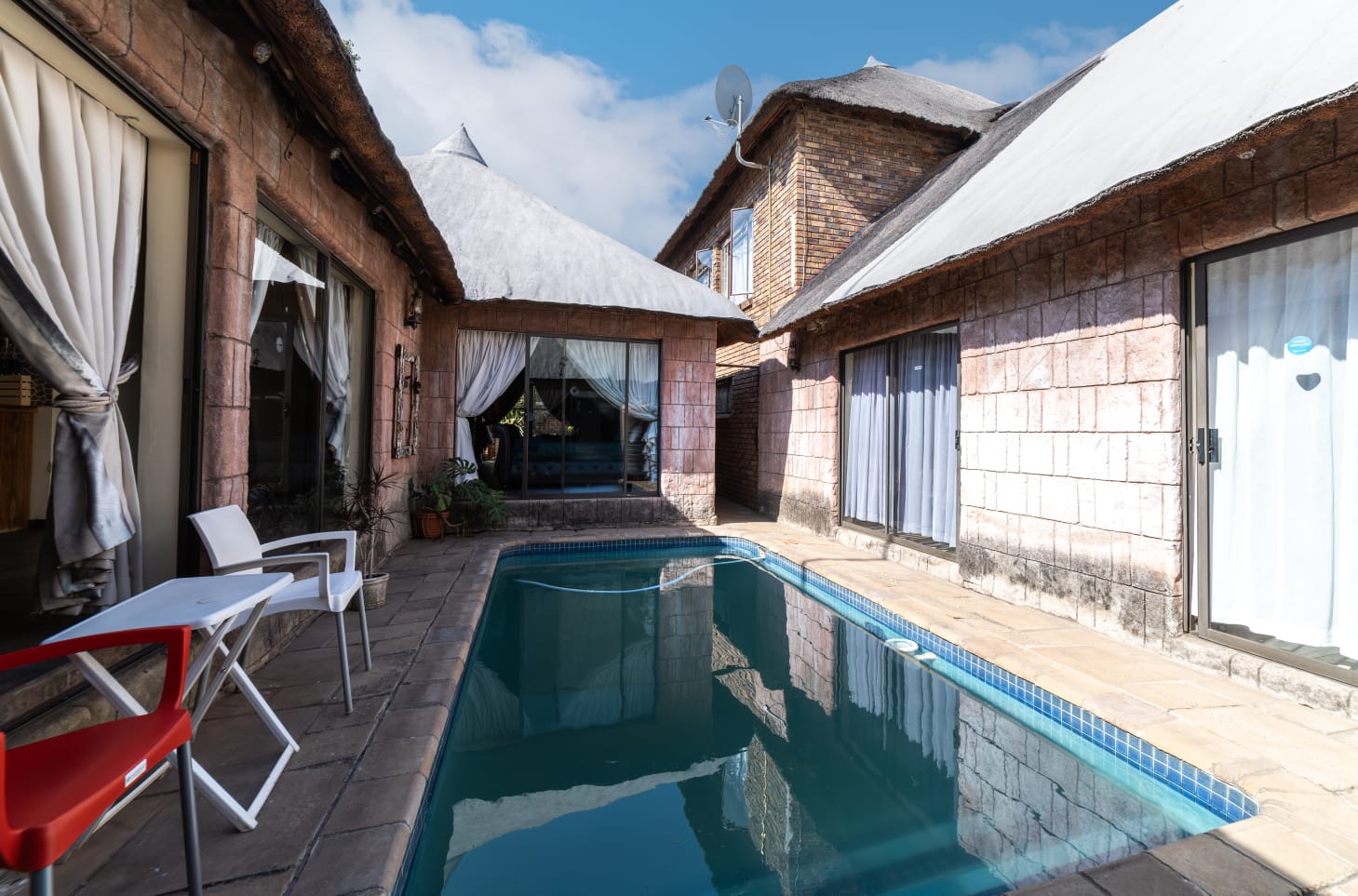 Private swimming pool in the garden at Thatch Haven accommodation, Centurion